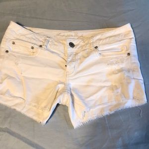 AE distressed white shorts
